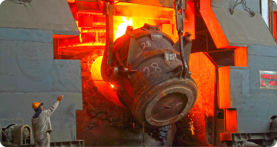 Steel mills converter filling materials, closeup of photo 