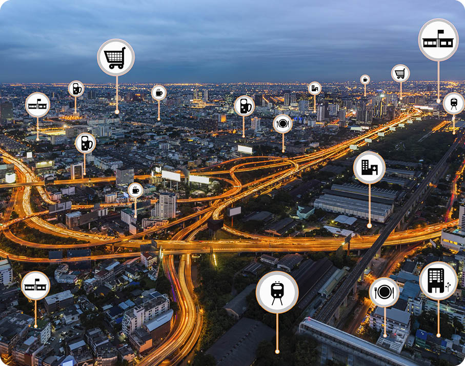 Smart city things icons mesh on city traffic night background and wireless communication network, business district with expressway and highway  (Business and Internet concept) 
