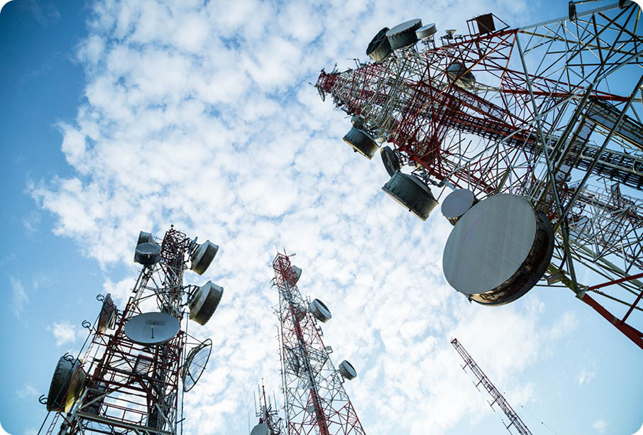 Telecommunication mast TV antennas wireless system technology with blue sky in the morning 